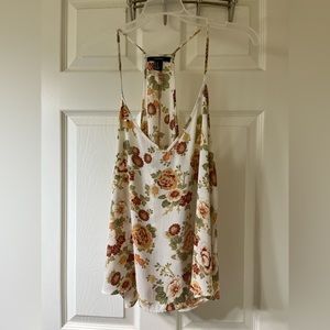 Never worn flower tank. Size M